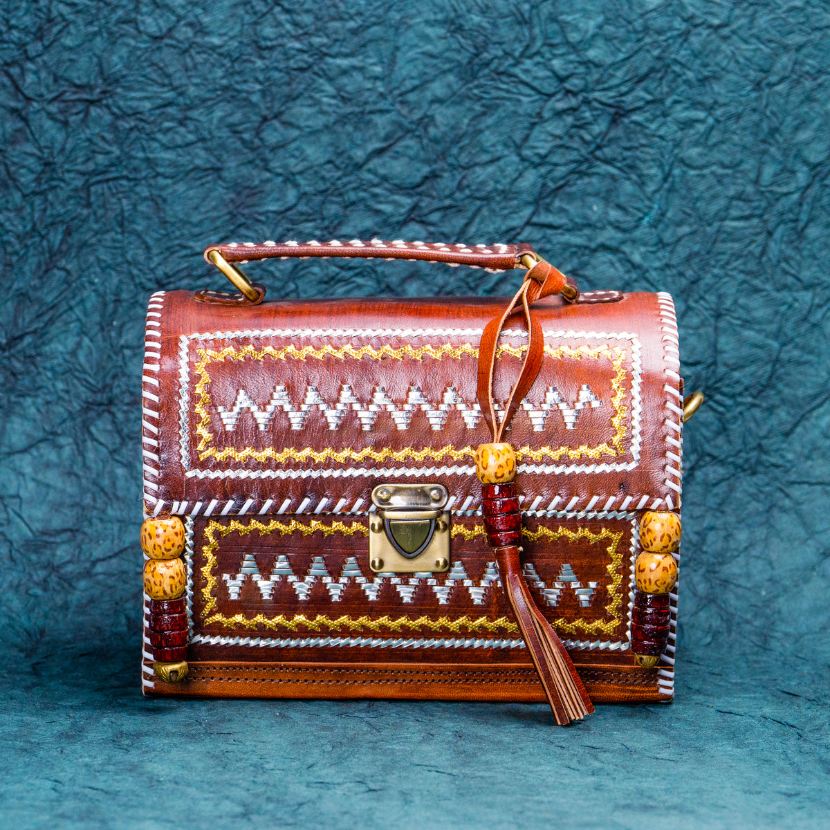 Maroon zig zag Leather Kucth - sling bag